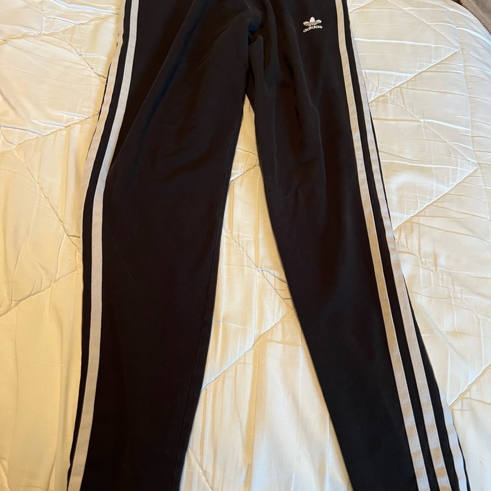 Adidas Black Sweatpants with Iconic Three Stripes
